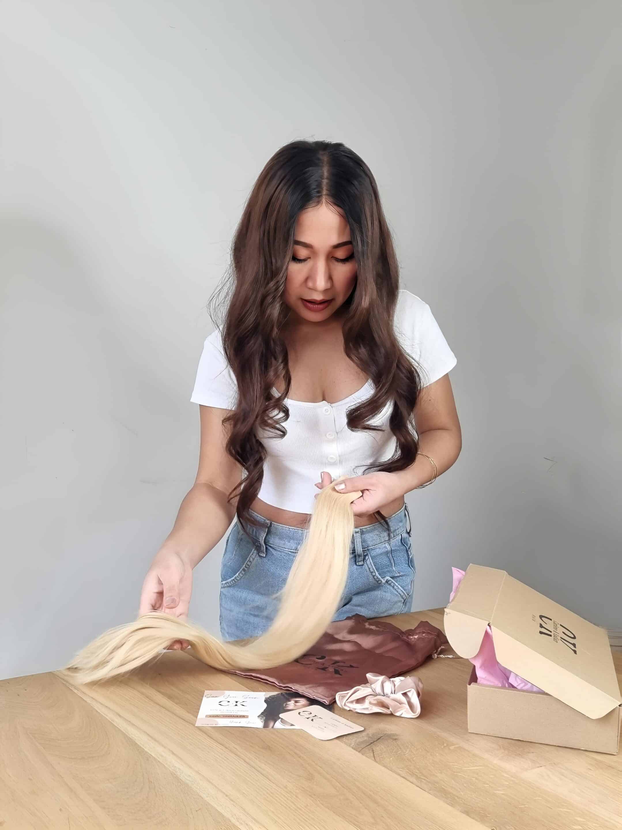 Professional,Hairdresser,Making,Hair,Extensions,For,Blonde,Girl,In,A